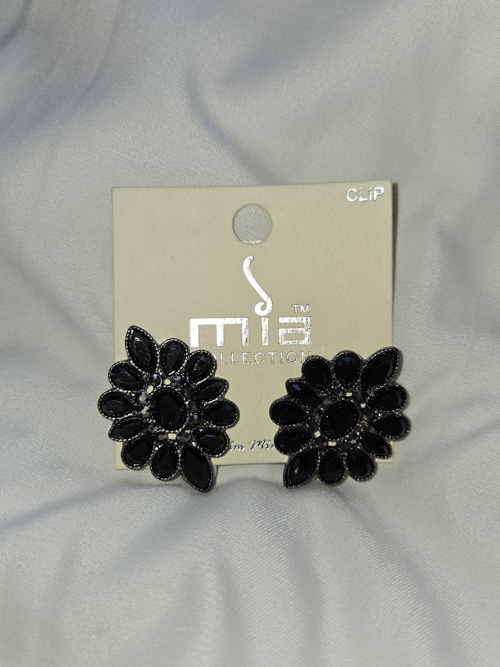 Misha Collection Black Floral Clip-On Earrings - Bold Petal Design